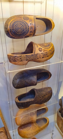 Zaanse Schans, Netherlands - April 16. 2024: Clogs, traditional wooden shoes - klompen - a symbol of...