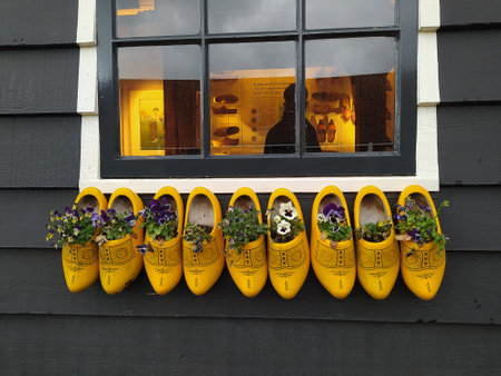 Zaanse Schans, Netherlands - April 16. 2024: Clogs, traditional wooden shoes - klompen - a symbol of Holland, in the store of Zaanse Schans museumのeditorial素材