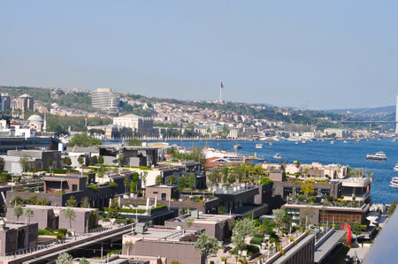 Istanbul, Turkey - Galataport waterfront in Karakoy with a view of the city skyline from abstract cruise shipの写真素材