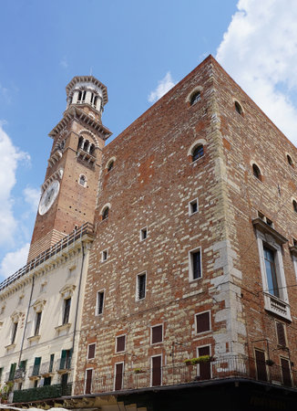 Torre dei Lamberti Tower with Clock in Verona, Italy in Romanesque Styleの写真素材