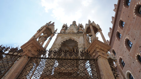 Gothic funerary monument of Cansignorio della Scala in Verona, Italy. 14th-century stone tomb with sculptural details and an equestrian statue.の写真素材