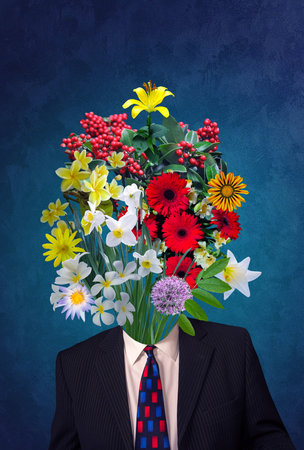 Good news. Businessman in formalwear standing against color studio background. Artwork of man with flowers instead headの写真素材
