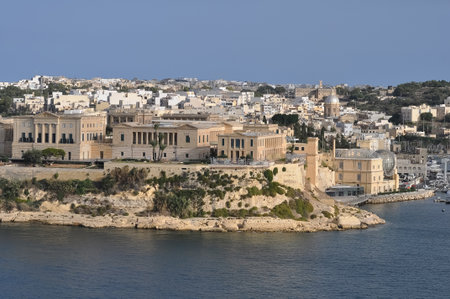 The historic Bighi Complex in Kalkara, Malta, featuring imposing architecture and coastal views along Triq Marina. Cultural heritage of Maltaの写真素材