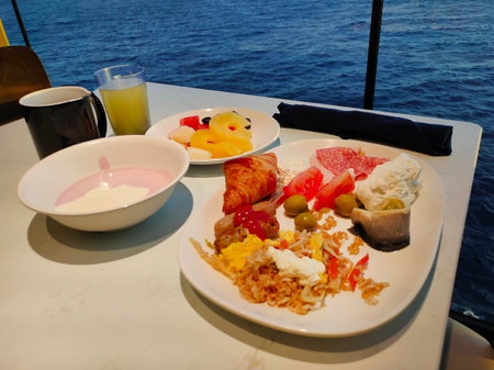 Dining Room Buffet aboard the abstract luxury cruise ship. Healthy food at modern liner conceptの写真素材