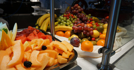 Dining Room Buffet aboard the abstract luxury cruise ship. Healthy breakfast at modern liner concept - fresh fruitsの写真素材