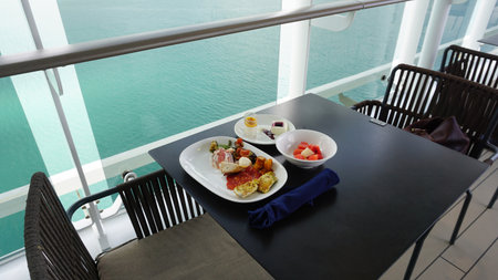 Dining Room Buffet aboard the abstract luxury cruise ship. Healthy food at modern liner conceptの写真素材