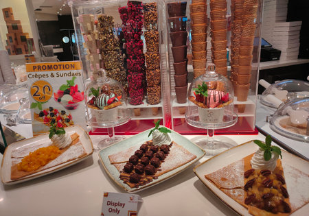 Barcelona, Spain - September 26, 2025: Interior of the chocolate bar in cruise ship MSC World Europaのeditorial素材