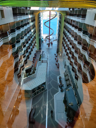 Valletta, Malta - September 24, 2025: Beautiful view of deck and promenade from MSC World Europa cruise ship. Dry stainless steel spiral slide called Venom Drop The Spiralのeditorial素材