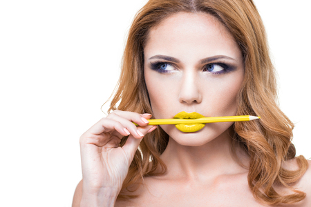 Beauty Woman with Professional Makeup on a White Background.の写真素材