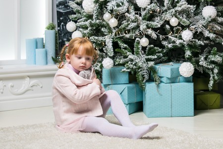 Very nice charming little girl in pink jaketの写真素材