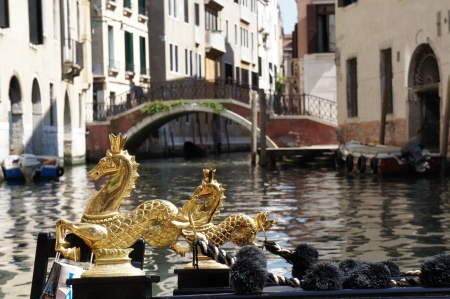 Close-up gondola on canal in Venice canalの写真素材