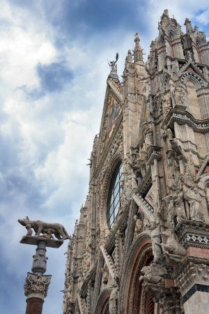 Duomo of Siena, Tuscany, Italy  Siena cathedral against a bright blue skyの写真素材