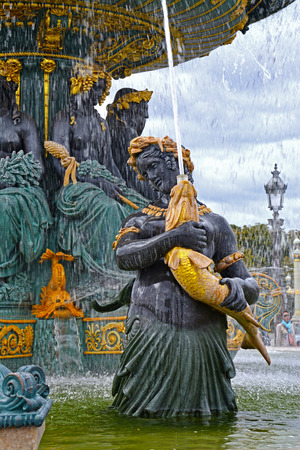 Fontaines de la Concorde on Place Concorde in Paris, France. Fountain of River Commerce and Navigation on the Champs Elysees in Paris, France.の写真素材