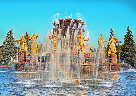 Fountain "Friendship of Nations" with rainbow in All-Russia Exhibition Centre, Moscow, Russiaの写真素材