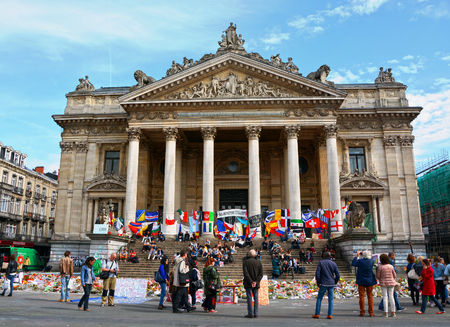 BRUSSELS - APRIL 21, 2016: People gathered in front of the Stock Exchange to remember the victims of the terrorist attacks that took place on March 22.の写真素材