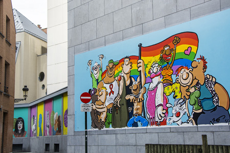 BRUSSELS - APRIL 21, 2016: Street art. Colorful graffiti  for the gay pride parade on a wall of house in Brussels.のeditorial素材