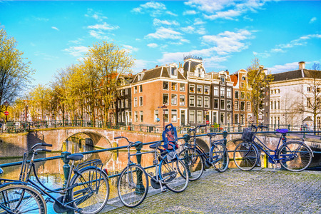 Bicycles parked on a bridge in Amsterdam, Netherlandsのeditorial素材
