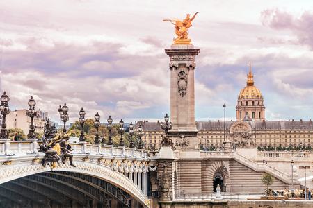 Pont Alexandre III (Alexandre III bridge) and Les Invalides dome in Paris, Franceの写真素材