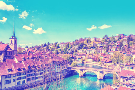 Panoramic view on old town of Bern over the Aare river, capital of Switzerland. Travel background...
