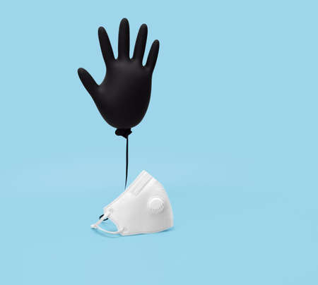 Medical gloves and a protective mask on a blue background. FFP2 respirator. concept of protection and prevention from viruses. Coronavirus, covid-19. Copy space.の写真素材