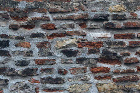 Brickwork background. Concrete wall with bricks texture. Old masonry. Cement texture for design.の写真素材