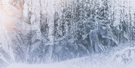 Ice pattern on the winter window. Frost drawing texture. Banner.の写真素材