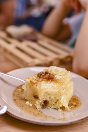 Traditional Slovenian dessert made of dough, cheese and fruit. Dumplings with nuts and figs for a delicious breakfast in a European cafe.の写真素材