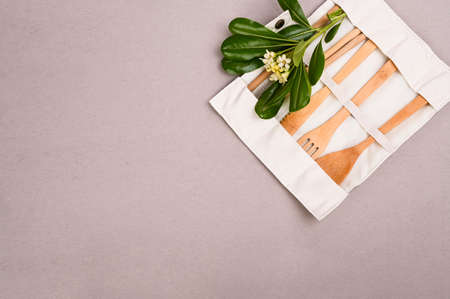 Eco friendly bamboo cutlery set on gray background. Zero waste. Sustainable lifestyle. Plastic free conceptの写真素材