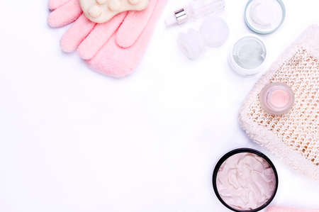 The layout of cosmetics on a white background. Natural cosmetics for face and body care. Top view....