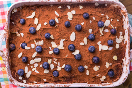 Tiramisu. Traditional italian dessert on white plate. Delicious dessert for breakfast, with...
