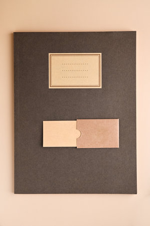branding mockup with many craft paper and different subjects. Office desk with a paper notepad and a...