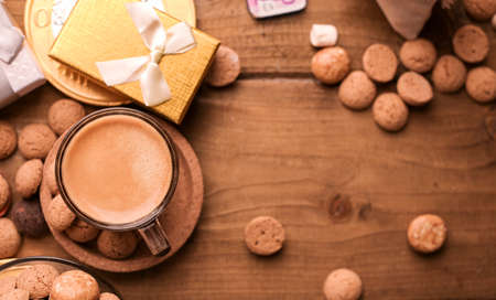 Dutch holiday Sinterklaas. kruidnoten cookies sweets, chocolate . Children party Saint Nicholas day five december. espresso coffee and sweets. space for text.の写真素材