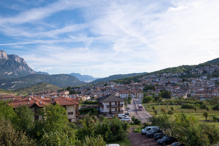Panorama of Trento. Mountains, clouds, green forests and hiking trails. High quality photo