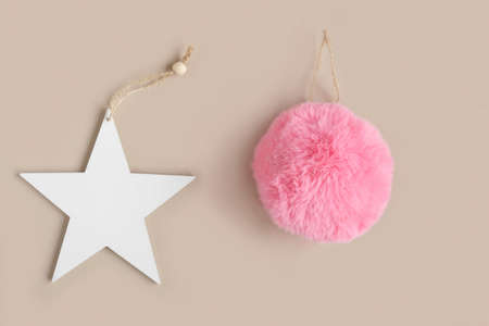 Eco christmas toys. Wooden christmas star decoration on neutral beige background with copy space. Eco friendly Christmas decor for home, waste-free concept. Composition in eco-style. Top viewの写真素材