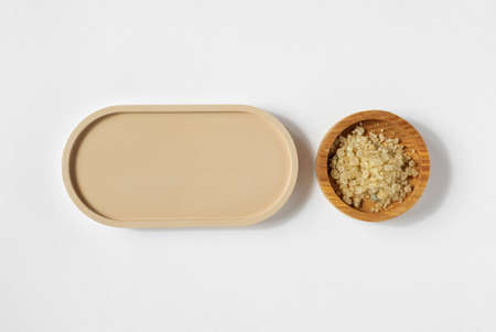 Oval podium, white background. Natural skin care, SPA design. Mineral organic oil. mockup. Flat lay,...
