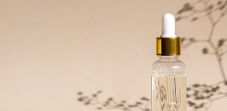 Natural oil cosmetics on neutral background. Dropper Glass Bottle Mock-Up. Oily cosmetic pipette. Face and body treatment, spa concept. Mineral organic oil. Flat lay with beauty products. blank bottleの写真素材