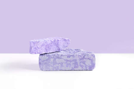 Stone Podium for promotion on violet Background. Natural pedestal. Two stone podiums. Beauty product...