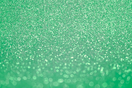 Abstract Glitter Background. Green Texture Sparkling Shiny Paper for Christmas Holiday. Seasonal...