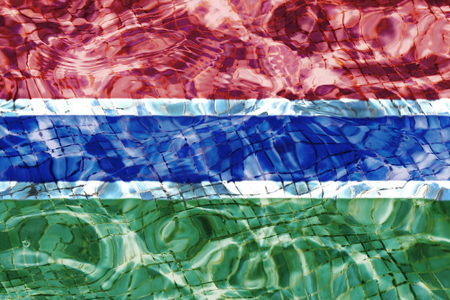 Texture of Gambia flag in the pool, water. Splashes.の写真素材