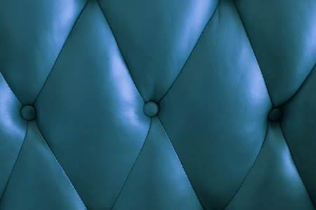 The back of the vintage leather couch.の写真素材