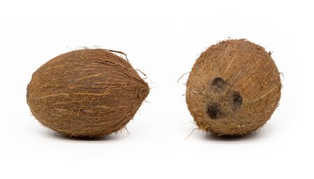 Isolated on a white background whole coconut 2 angles with shadow.の写真素材