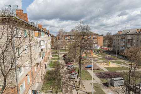 An empty courtyard and a playground tied with prohibitive ribbons in Russia due to the global impact of COVID-19.のeditorial素材