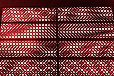 Abstract texture of red luminous blur lamps on a black background.の写真素材