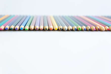 Set of colored watercolor pencils isolated on a white backgroundの写真素材