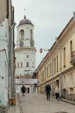 City Vyborg. Russia - September 16, 2021: The State Museum Vyborg Castel: a road paved with stone...