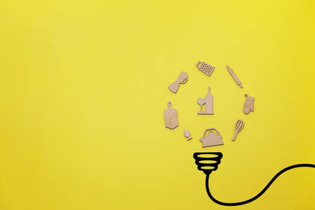Creative thinking ideas and innovation concepts. A ball of food preparation items with a light bulb...