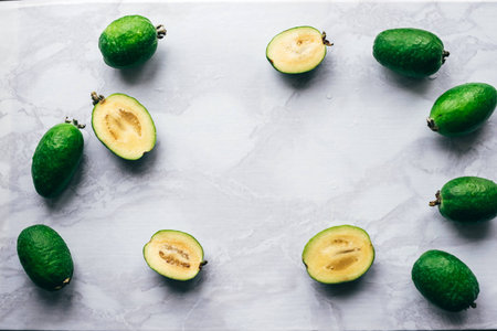 frame from feijoa with place for your own text, copy space, white backgroundの写真素材
