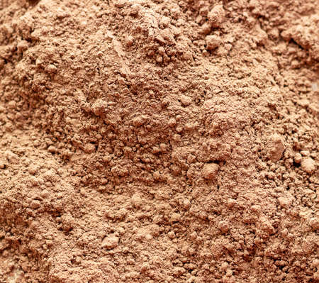 Close up of the scattered cocoa powder. macro view of cocoa powder. It's used for making the chocolate.の写真素材