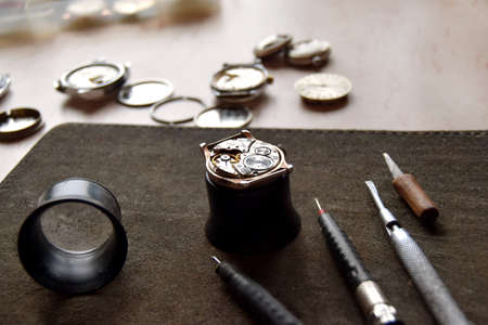 Workplace of a watchmaker repairing a classic mechanical watch. November 15, 2021, Russia,...