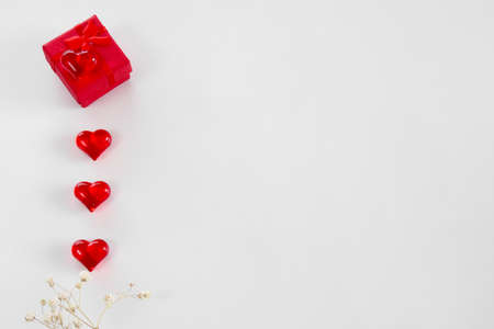 Red box with red hearts. concept of love for mom and Valentines Day. copy spaceの写真素材